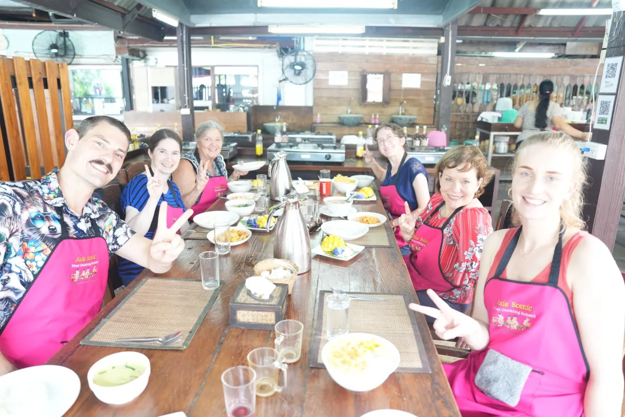 Cooking Ambassadors enjoying the Thai dishes they prepared at Asia Scenic Thai Cooking School in Chiang Mai.